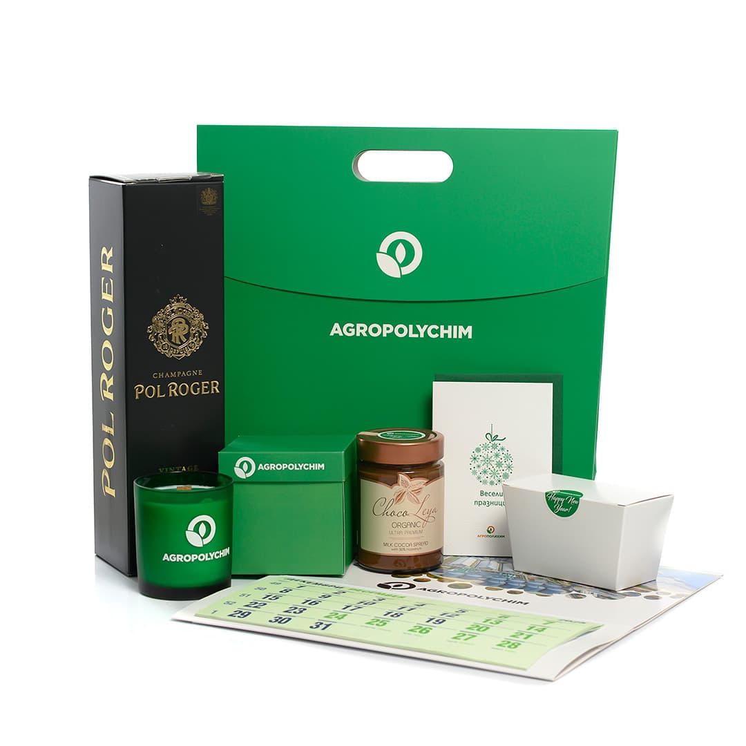 Agropolychim Firmengeschenkset mit Pol Roger Champagner, Kerze, Schokoaufstrich, Kalender und einer Grußkarte.